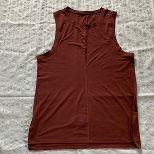 Nike dri-fit slim fit sz. Medium women’s tank top rust color